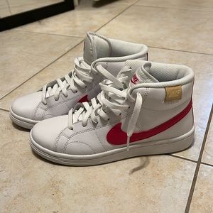 White and pink high top Nikes